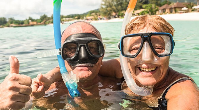 Senior-couple-enjoying-vacations-with-reverse-mortgage